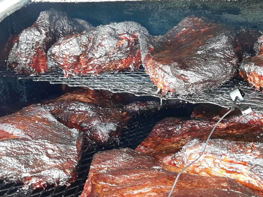 Briskets being cooked